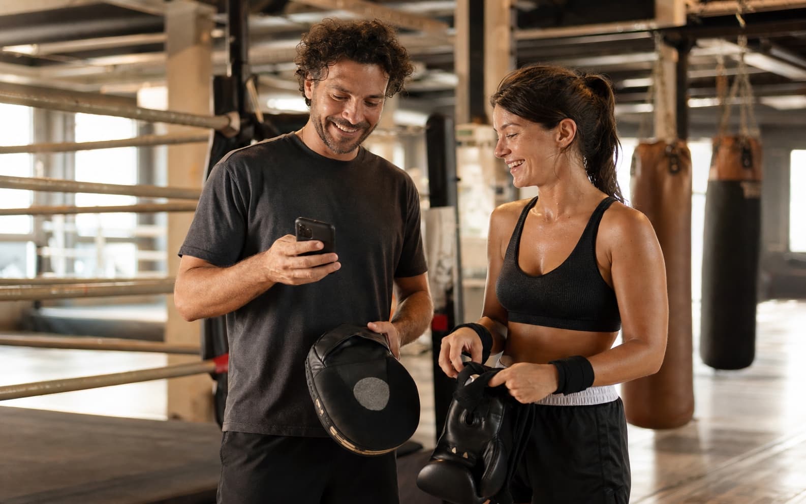 Boxing coach seeing paid status after a session